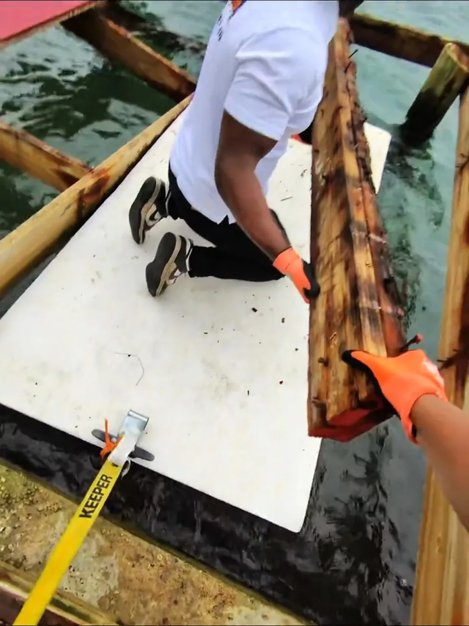 Pulling a dock board onto the float
