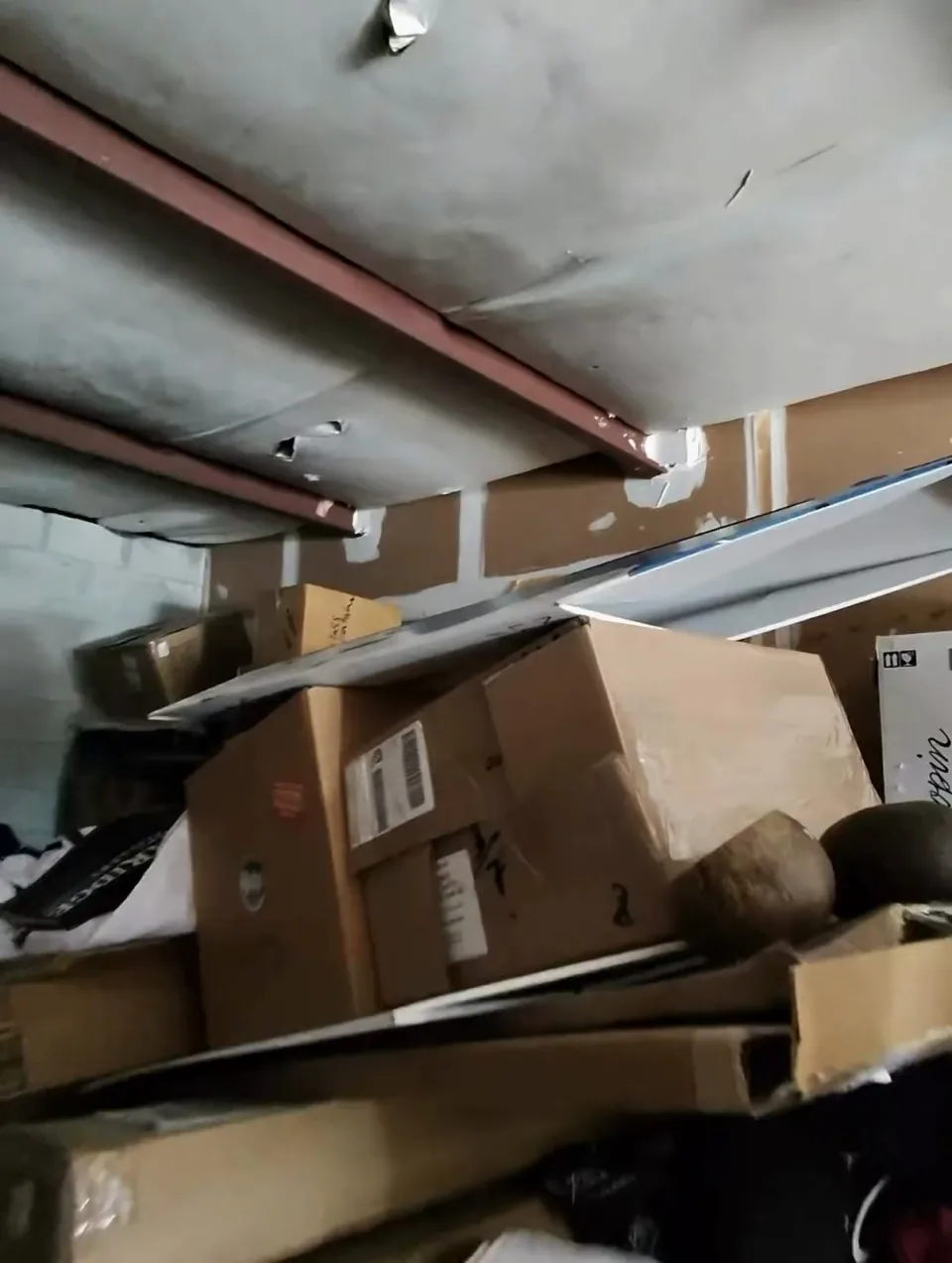 Storage unit stacked with boxes