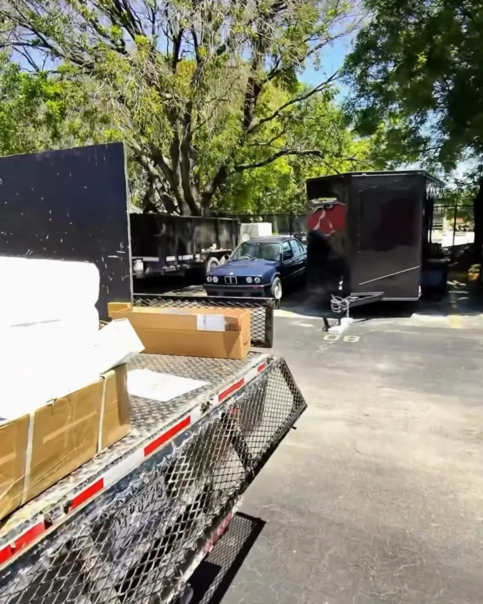 Company flatbed loaded with boxes from a storage unit