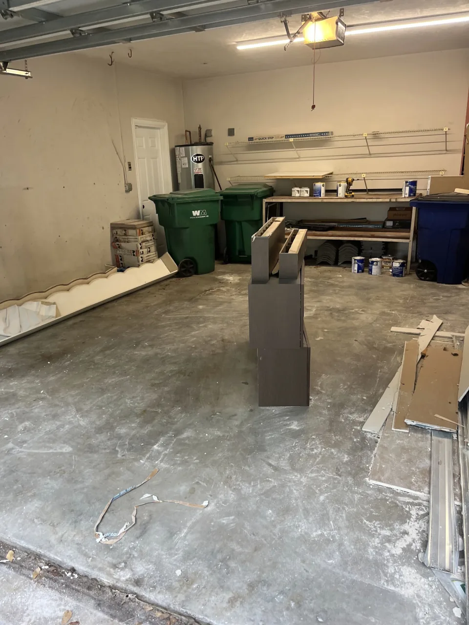 Empty swept concrete garage floor after a cleanout