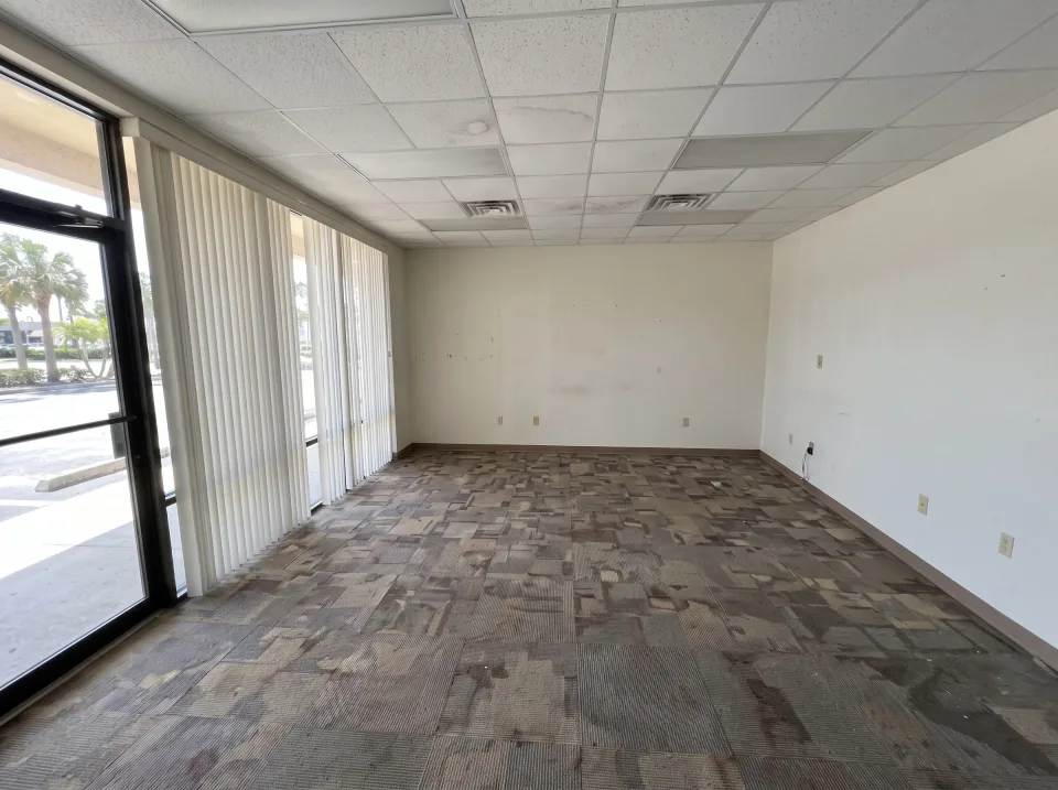 Illustration, after: all desks, chairs, filing cabinets, boxes and the copier removed