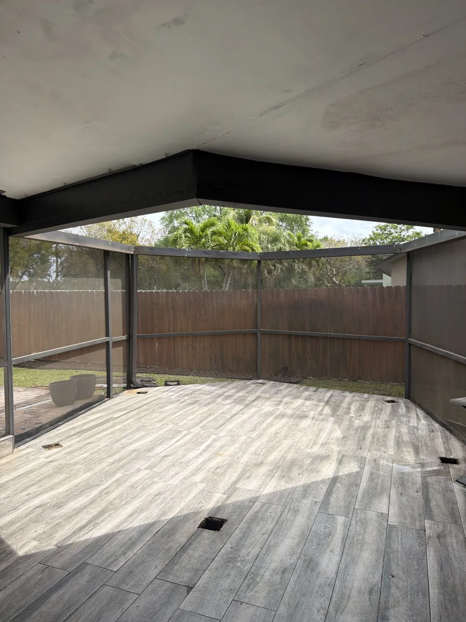 Empty, raked patch of yard where a shed used to stand
