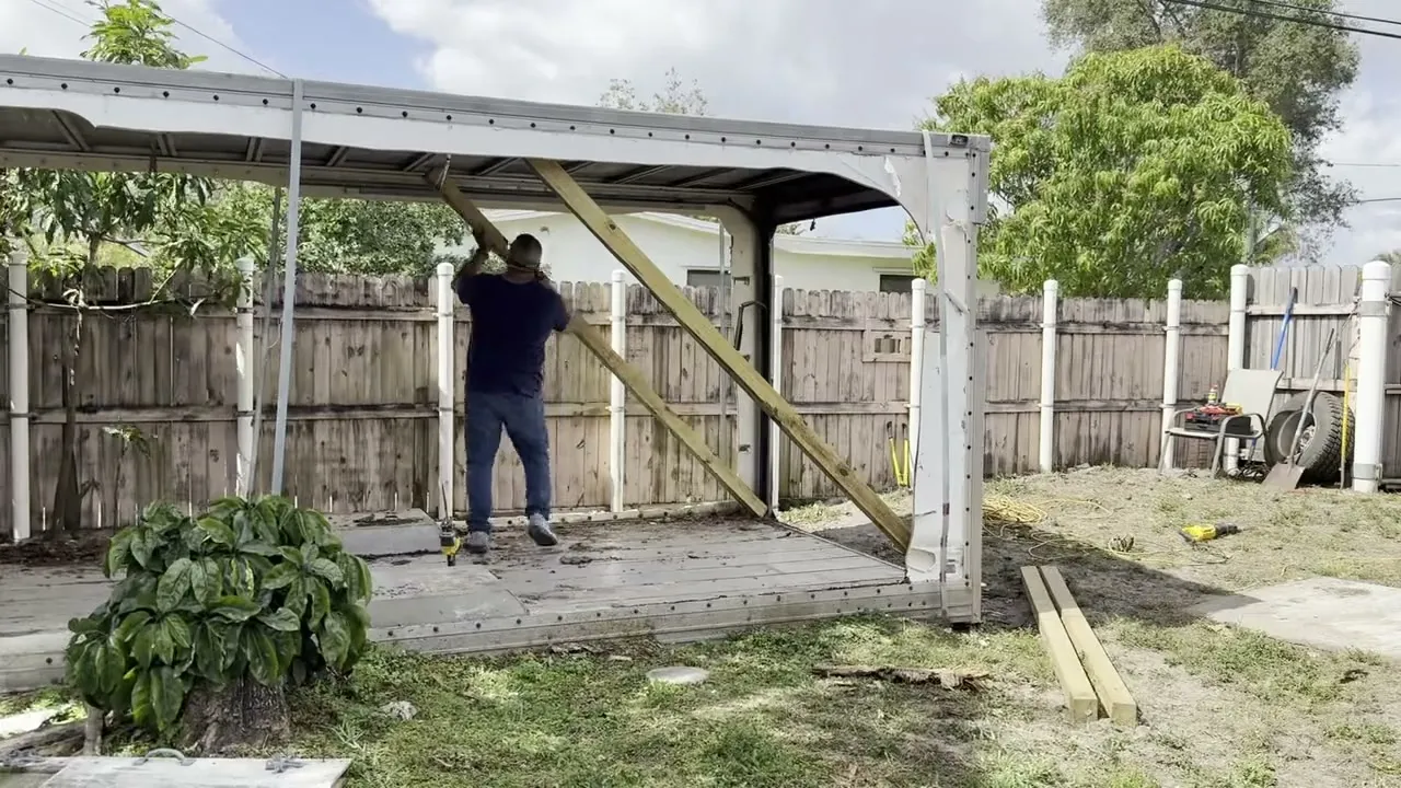 Time-lapse of the Rapid Haul crew cutting the last brace and dropping a shed roof